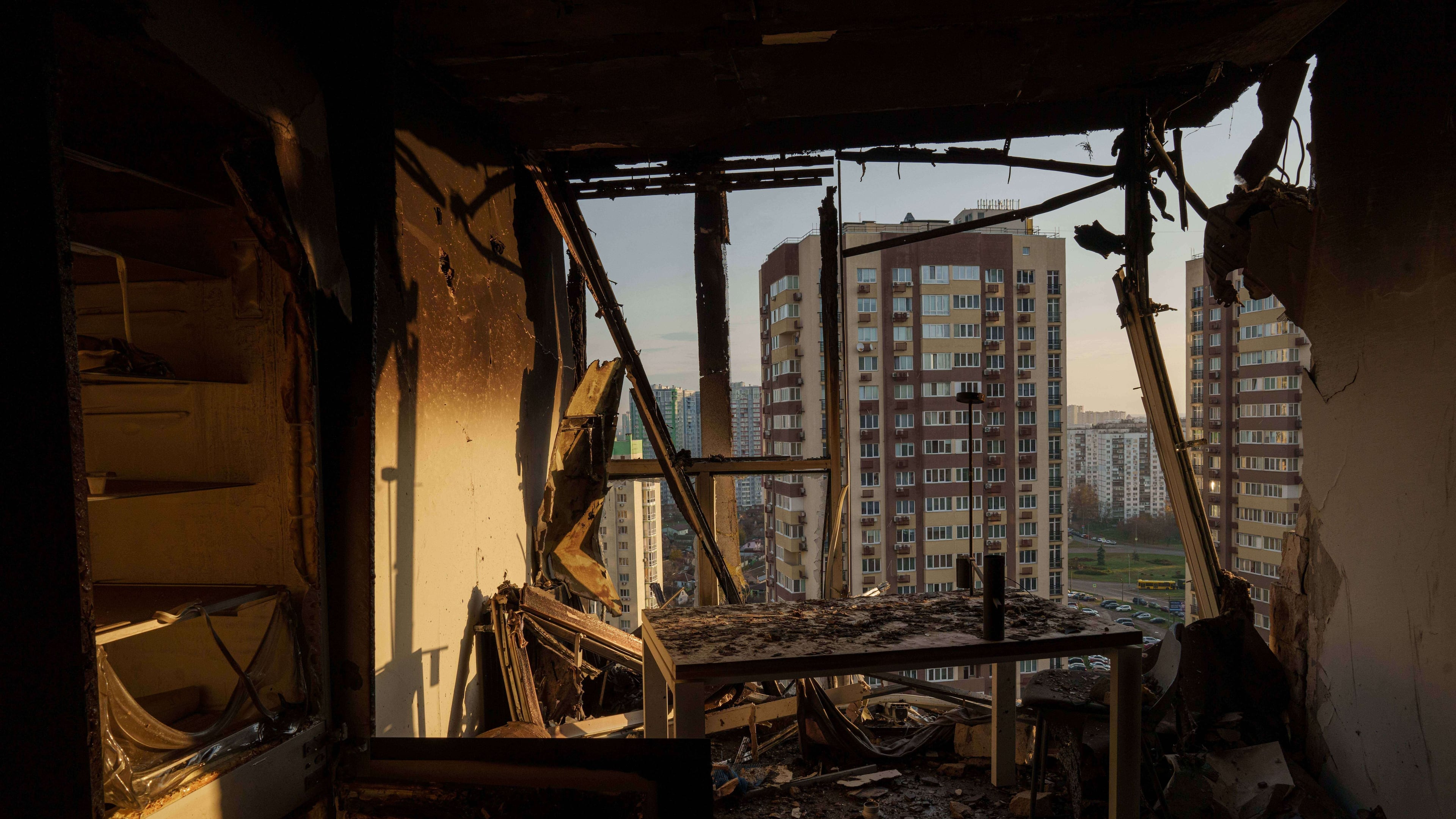 An apartment is seen damaged after a Russian attack on residential neighbourhood in Kyiv, Ukraine, on Friday, Nov. 14, 2025. (AP Photo/Evgeniy Maloletka)