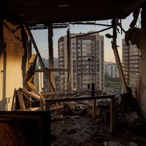 An apartment is seen damaged after a Russian attack on residential neighbourhood in Kyiv, Ukraine, on Friday, Nov. 14, 2025. (AP Photo/Evgeniy Maloletka)