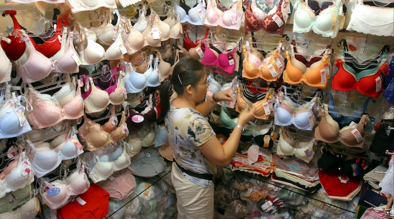 A high school student who went braless last week in Florida was told to use bandages to "cover up."