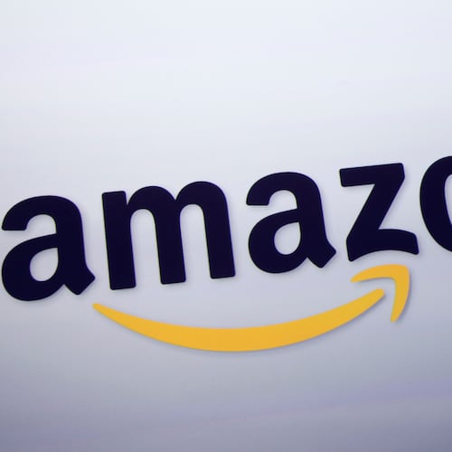 FILE - The Amazon logo is displayed at a news conference in New York on Sept. 28, 2011. (AP Photo/Mark Lennihan, File)