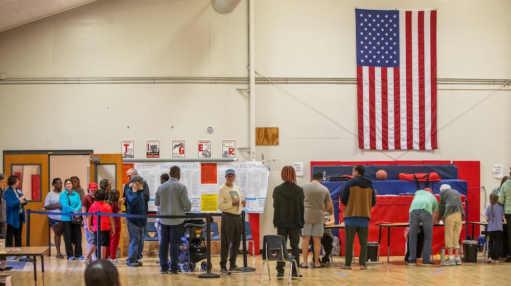 Gwinnett County voters cast their ballots on Election Day at W.J. Cooper Elementary School in Loganville on Tuesday, Nov 5, 2024. More than 500 people had voted by 10 a.m. at this location. (Jenni Girtman for The Atlanta Journal-Constitution)