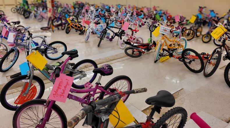 Bikes for Kids Alpharetta is collecting, cleaning and repairing donated new and gently used bikes/trikes for the Toyland Shop at North Fulton Community Charities. COURTESY BIKE ALPHARETTA