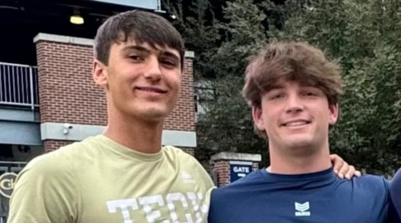 Harrison Faulkner (L) and Jake Bobo are best friends. Faulkner's father Buster is offensive coordinator at Georgia Tech. Jake's dad Mike coordinates the Georgia Bulldogs' offense. Harrison Faulkner plays quarterback for North Oconee High while Jake Bobo plays quarterback at Prince Avenue Christian School. Rarely are their fathers able to attend their games. (Photo provided by Harrison Faulkner)
