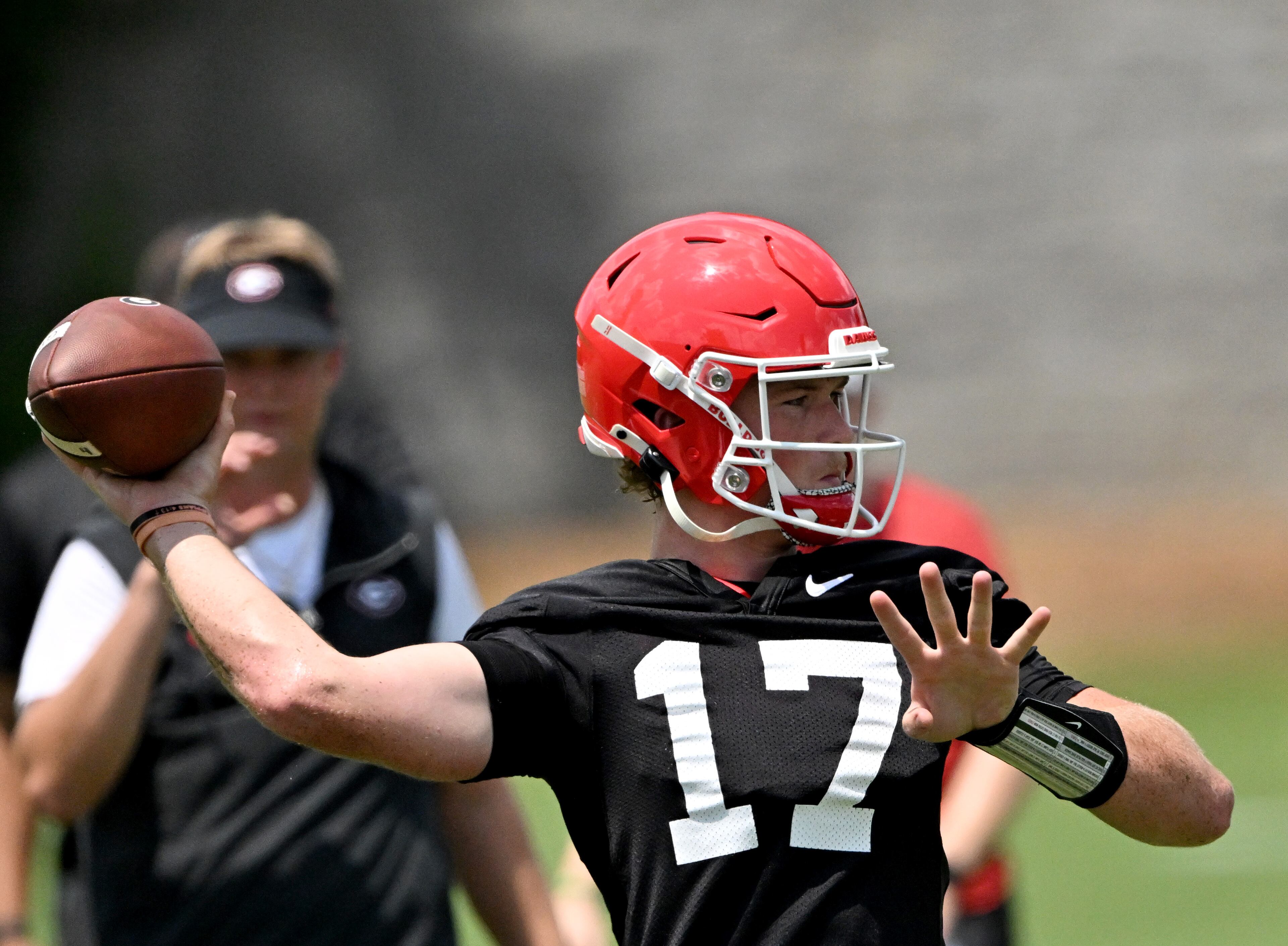 Georgia quarterback Colter Ginn (17) runs a drill during a football practice at the University of Georgia practice facility, Thursday, July 31, 2025, in Athens. (Hyosub Shin / AJC)
