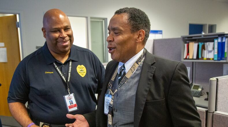 Gwinnett’s Democratic solicitor general, Brian Whiteside (right), chats with Curtis Clemons at the Gwinnett Justice and Administration Center in Lawrenceville on Friday October 11th, 2019. (Photo by Phil Skinner) AJC FILE PHOTO