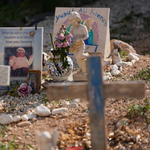 Tombs of migrants, including two babies, who died in shipwrecks are seen at the cemetery on the island of Lampedusa, southern Italy, Friday, July 3, 2026, one day before Pope Leo XIV's visit. ( AP Photo/Alessandra Tarantino)
