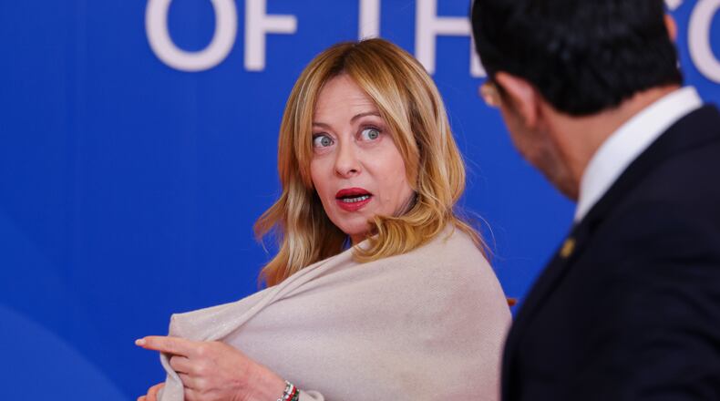 Italy's Prime Minister Giorgia Meloni, left, speaks with Cypriot President Nikos Christodoulides as she arrives for the EU Summit in Nicosia, Cyprus, Friday, April 24, 2026. (Yves Herman, Pool Photo via AP)