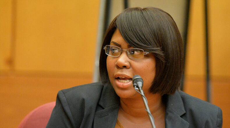 Former Parks Middle School math teacher Stacey Johnson testifies in court Thursday morning. Testimony continues in the Atlanta Public Schools test-cheating trial before Judge Jerry Baxter in Fulton County Superior Court, Thursday, October 2, 2014. KENT D. JOHNSON / KDJOHNSON@AJC.COM