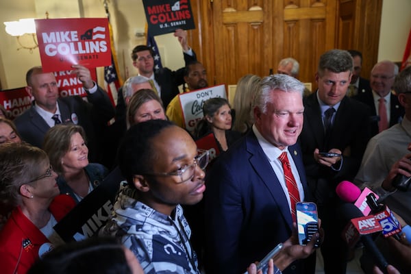 U.S. Rep. Mike Collins, R-Jackson, files his paperwork Friday. He is the early front-runner among Republicans who have made up their minds already. (Arvin Temkar/AJC)