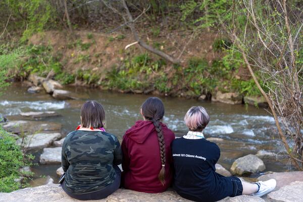 Dare, 16, Matthew, 15, and Jay, 13, of Dacula pose for a portrait on Friday, March 10, 2023. (Arvin Temkar / arvin.temkar@ajc.com)