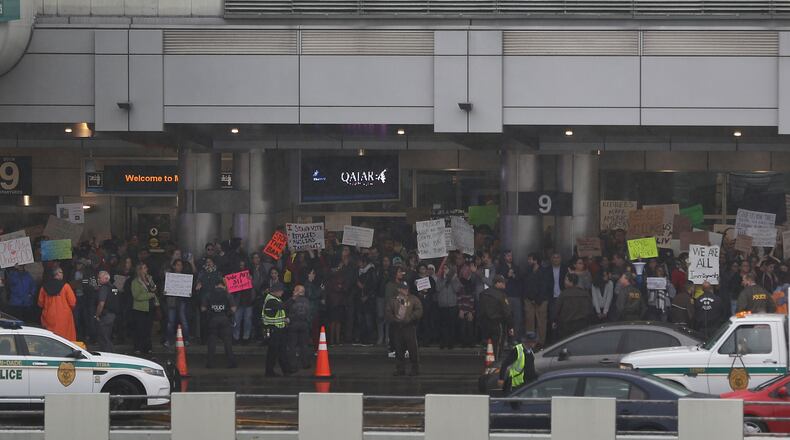 Protesters at airports across the nation, like Miami International pictured here, Atlanta's Hartsfield-Jackson, LAX, Washington Dulles, and more demonstrated for a second striaght day against President Donald Trump's executive order banning citizens from seven majority-Muslim nations from entering the U.S. for 90 days.