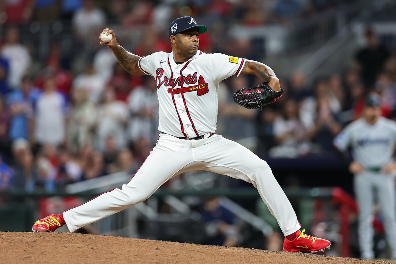 Atlanta Braves pitcher Raisel Iglesias delivers in the ninth inning of a baseball game against the Miami Marlins, Wednesday, April 15, 2026, in Atlanta. (AP Photo/Colin Hubbard)