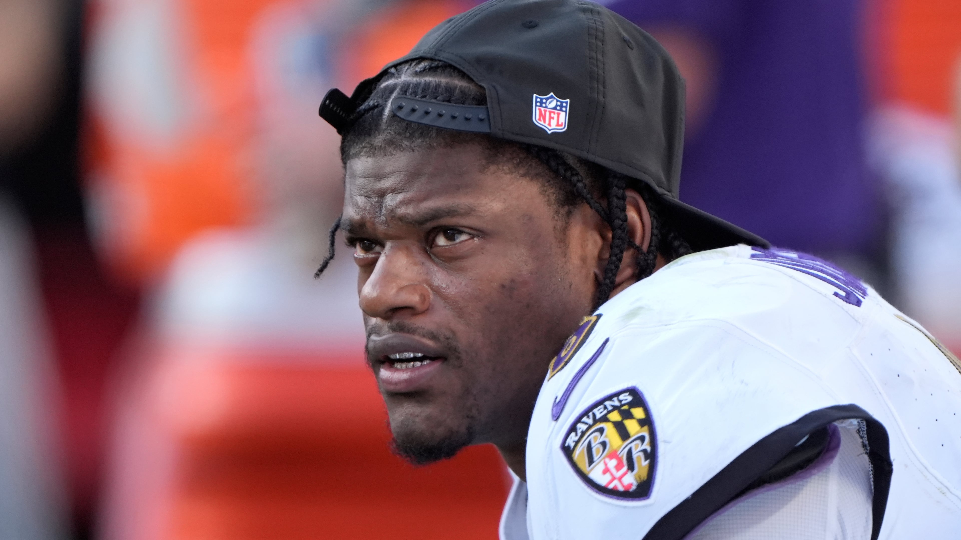 Baltimore Ravens quarterback Lamar Jackson sits on the bench after being replaced by Cooper Rush during the second half of an NFL football game against the Kansas City Chiefs Sunday, Sept. 28, 2025, in Kansas City, Mo. (AP Photo/Charlie Riedel)