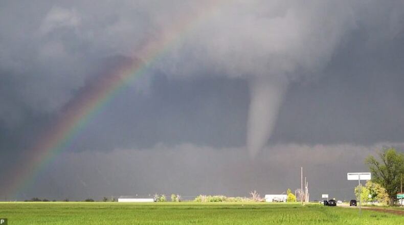 Storm chasers captured a tornado and rainbow side by side at the Texas-Oklahoma border near Vernon, Texas. (Image: Ryan Shepard via Twitter screenshot)