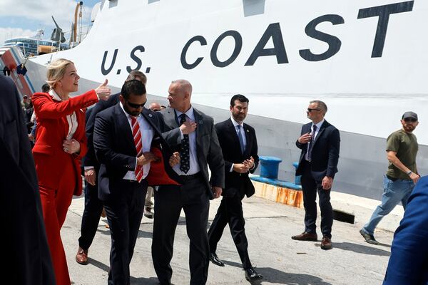 U.S. Attorney General, Pam Bondi gives a thumbs-up as she leaves a news conference with FBI Director Kash Patel after announcing the seizure of illegal narcotics on vessels headed for the U.S., Wednesday, April 9, 2025. (Amy Beth Bennett /South Florida Sun-Sentinel via AP)