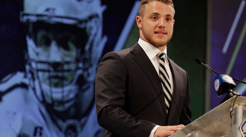 Georgia Tech's Brant Mitchell answers a question during a news conference at the NCAA Atlantic Coast Conference college football media day in Charlotte, N.C., Wednesday, July 18, 2018. (AP Photo/Chuck Burton)
