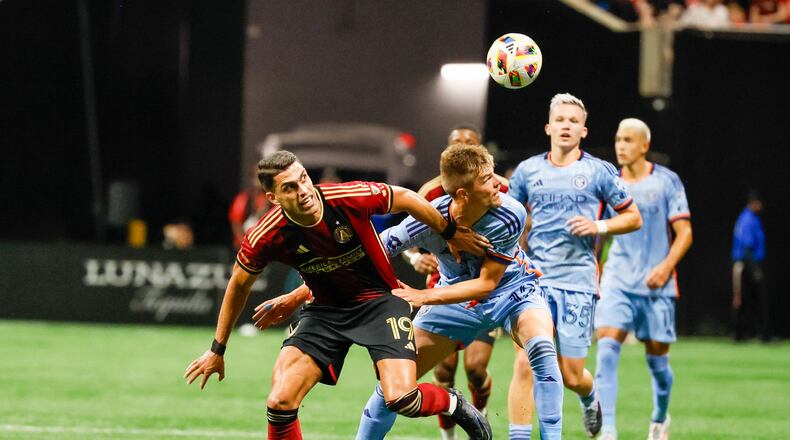 Atlanta United forward Daniel Ríos (19) battles for the ball against New York City defender Strahinja Tanasijević (12) during the first half against New Yor City at Mercedes-Benz Stadium on Wednesday, July 17, 2024. 
(Miguel Martinez/ AJC)