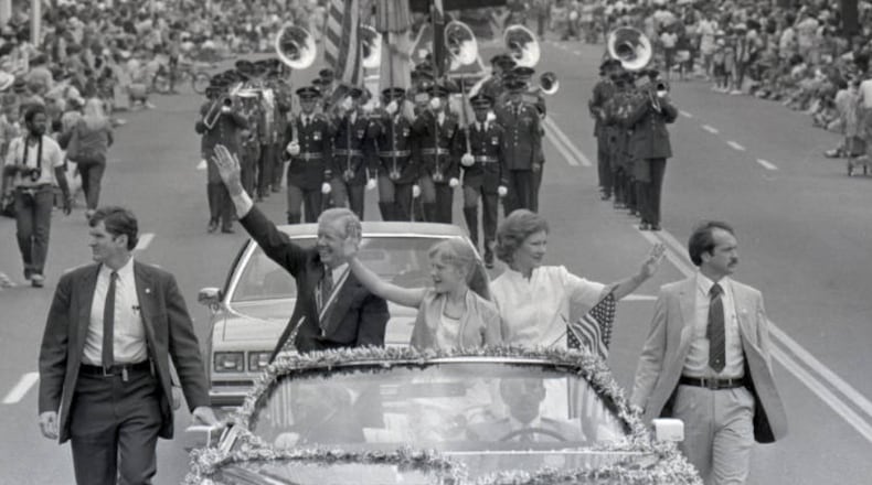Former President Jimmy Carter was greeted by cheers and applause along the parade route in downtown Atlanta, July 4, 1981. (AJC Photographic Archive, Georgia State University Library)