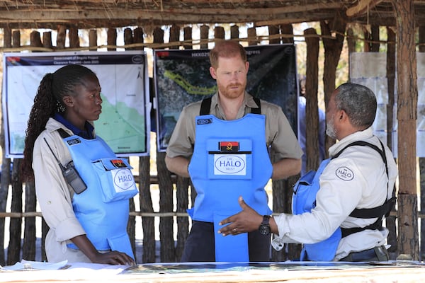 Britain's Prince Harry listens during a visit to see the work of landmine clearance charity of the Halo Trust, in Cuito Cuanavale, Cuando province, southern Angola, Wednesday, July 16, 2025. (Ampe Pedro/The Halo Trust via AP)