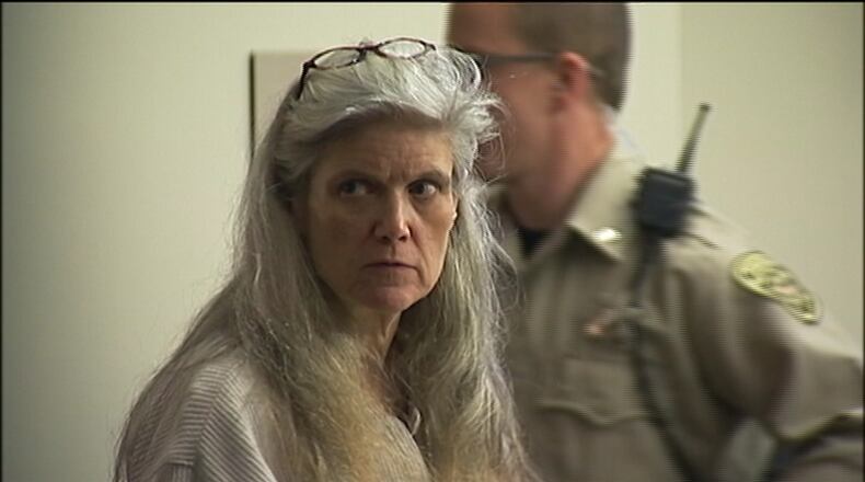 Melissa Blue stands in court as jurors deliberate if she should be found guilty of murder after her elderly mother was found dead.