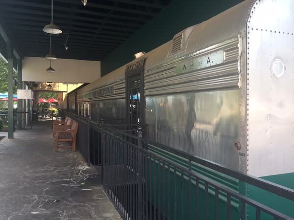 Diners enter the Orient Express through the “Chattahoochee River,” a vintage rail car. The popular Asian restaurant in Vinings is temporarily closed after a serious fire Thursday morning. (Courtesy of Olivia King)