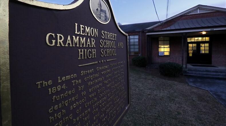 December 3, 2019 Marietta: The Lemon Street Grammar School is seen at sunset on Tuesday, December 3, 2019, in Marietta. The historically black elementary school was closed once the city school system was integrated.  Curtis Compton/ccompton@ajc.com