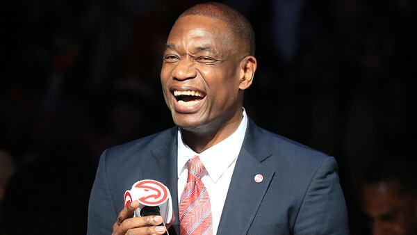 Dikembe Mutombo was all smiles when the Hawks retired his No. 55 jersey in 2015.