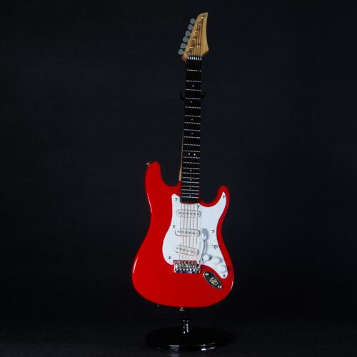 A miniature electric guitar in Phoenix, Saturday, June 2, 2026. (AP Photo/Dario Lopez-Mills)