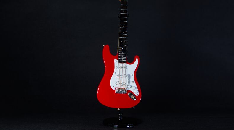 A miniature electric guitar in Phoenix, Saturday, June 2, 2026. (AP Photo/Dario Lopez-Mills)