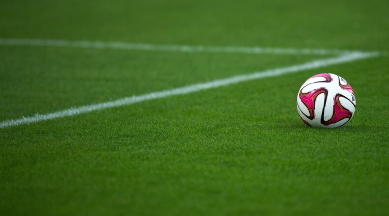 A ball is seen on the pitch prior to a soccer game.