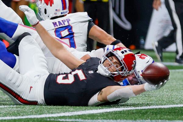 Drake London scores a touchdown during the first half against the Bills on Monday.