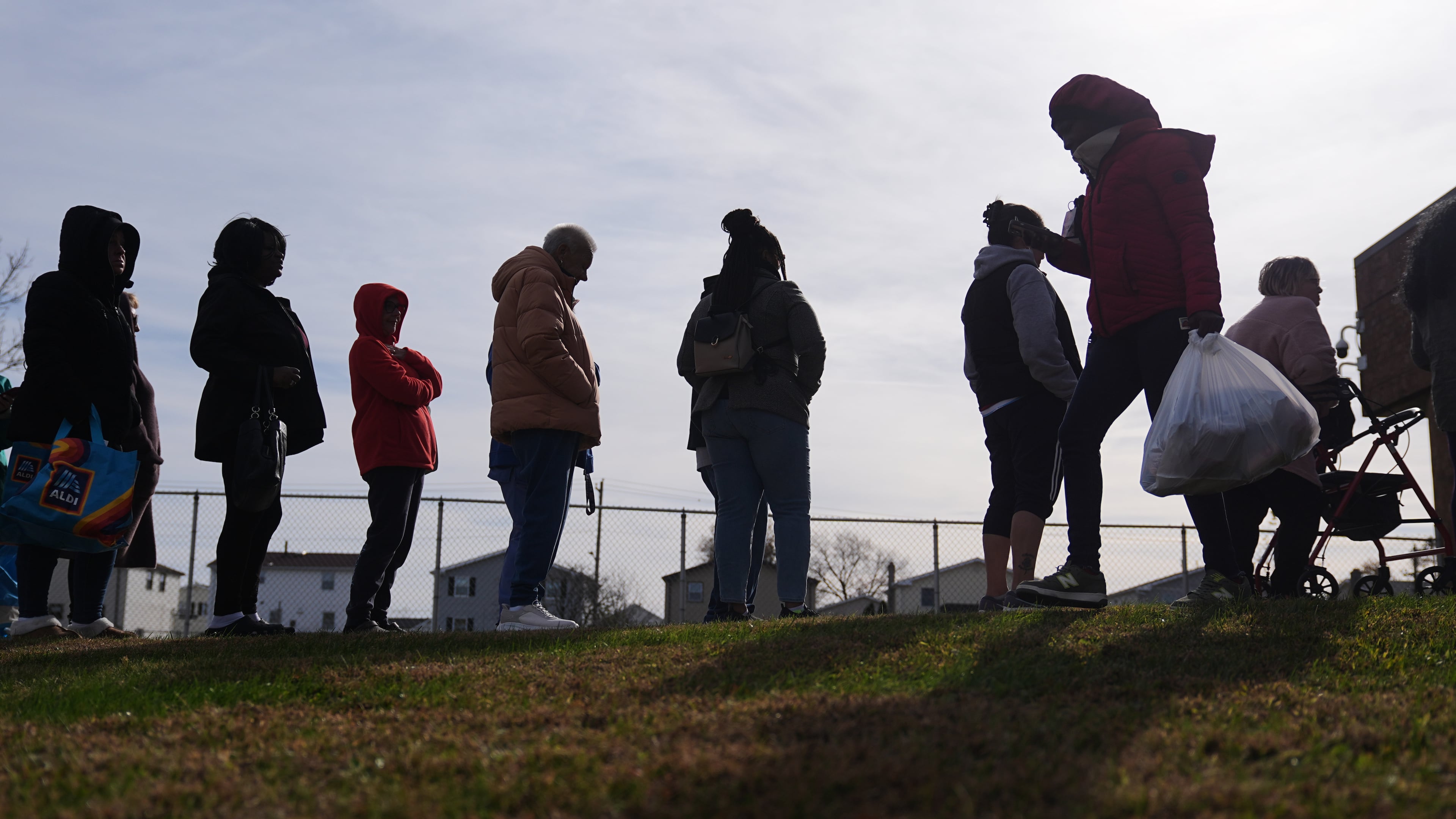 People wait in line durning an emergency food distribution at The Jewish Federation of Greater Philadelphia's Mitzvah Food Program in Philadelphia, Friday, Nov. 7, 2025. (AP Photo/Matt Rourke)