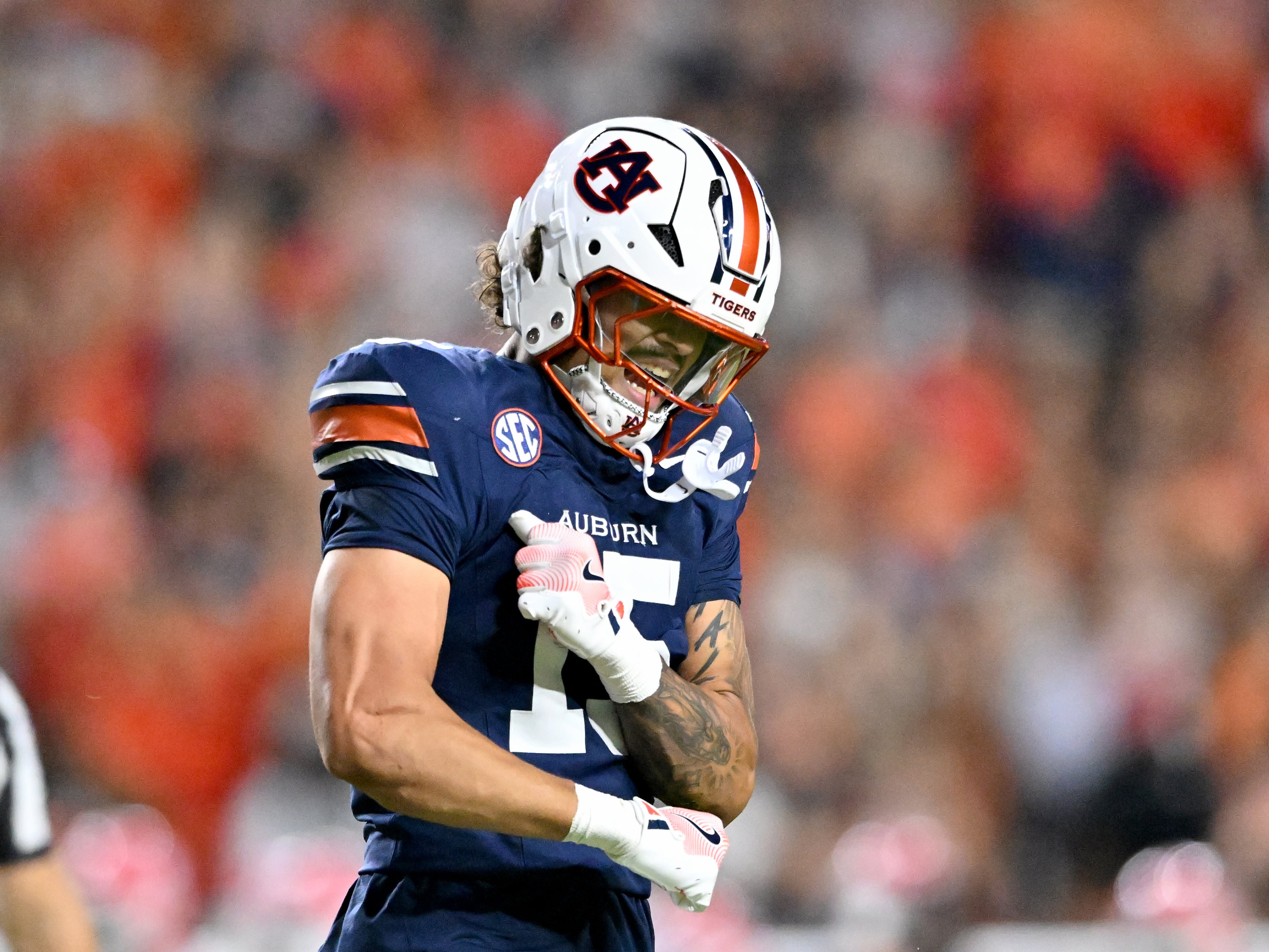 Auburn defensive end Keldric Faulk (15) reacts during the first half in a NCAA college football game at Jordan-Hare Stadium, Saturday, October 11, 2025, in Auburn, Ala. (Hyosub Shin / AJC)
