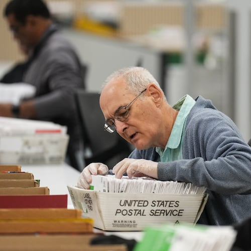 Workers sort ballots the day after California's primary election at the Los Angeles County Ballot Processing Center Wednesday, June 3, 2026, in City of Industry, Calif. (AP Photo/Jae C. Hong)