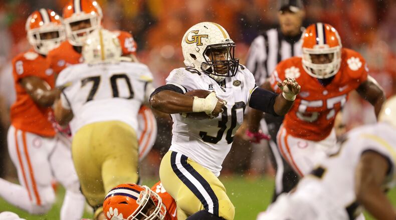 KirVonte Benson of the Georgia Tech Yellow Jackets runs with the ball against the Clemson Tigers during their game at Memorial Stadium on October 28, 2017 in Clemson, South Carolina. (Photo by Streeter Lecka/Getty Images)