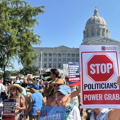 In this photo taken with a smartphone, people opposed to a congressional redistricting plan rally outside the Missouri Capitol in Jefferson City, Mo., Wednesday, Sept. 2, 2026. (AP Photo/David A. Lieb)