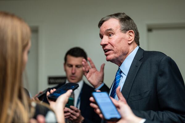
                        Sen. Mark Warner (D-Va.) speaks to reporters at the Capitol in Washington, March 25, 2025. Top Senate Democrats are pressing for more detailed information about the high-level group text chat in which Trump administration leaders discussed the plans for an attack on rebels in Yemen and included a journalist in the conversation. (Eric Lee/The New York Times)
                      