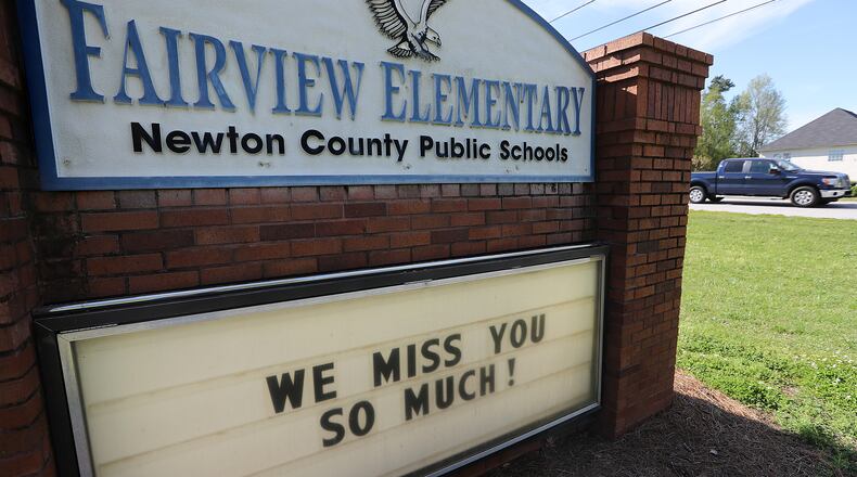 The Fairview Elementary School sign in Newton County says it all as Georgia Governor Brian Kemp annouces the state is closing schools for the rest of the year on Wednesday, April 1, 2020, in Covington. Curtis Compton ccompton@ajc.com