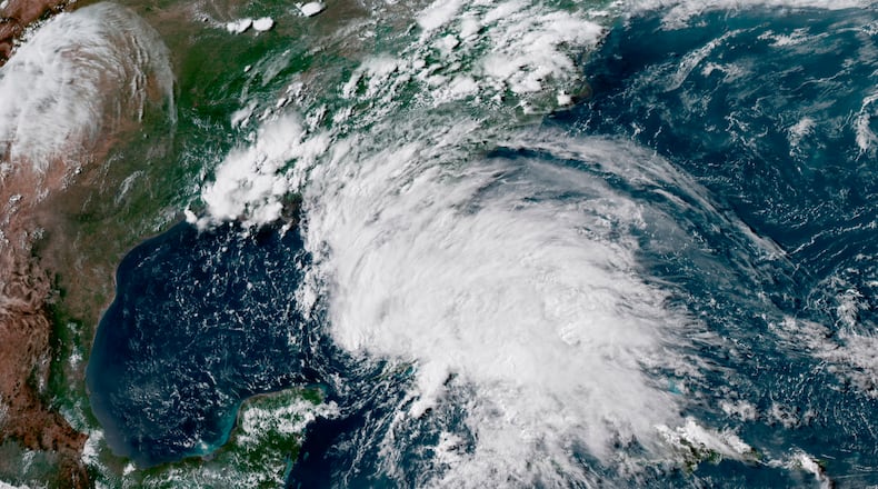 This satellite image provided by the National Oceanic and Atmospheric Administration (NOAA), shows Subtropical Storm Alberto in the the Gulf of Mexico.