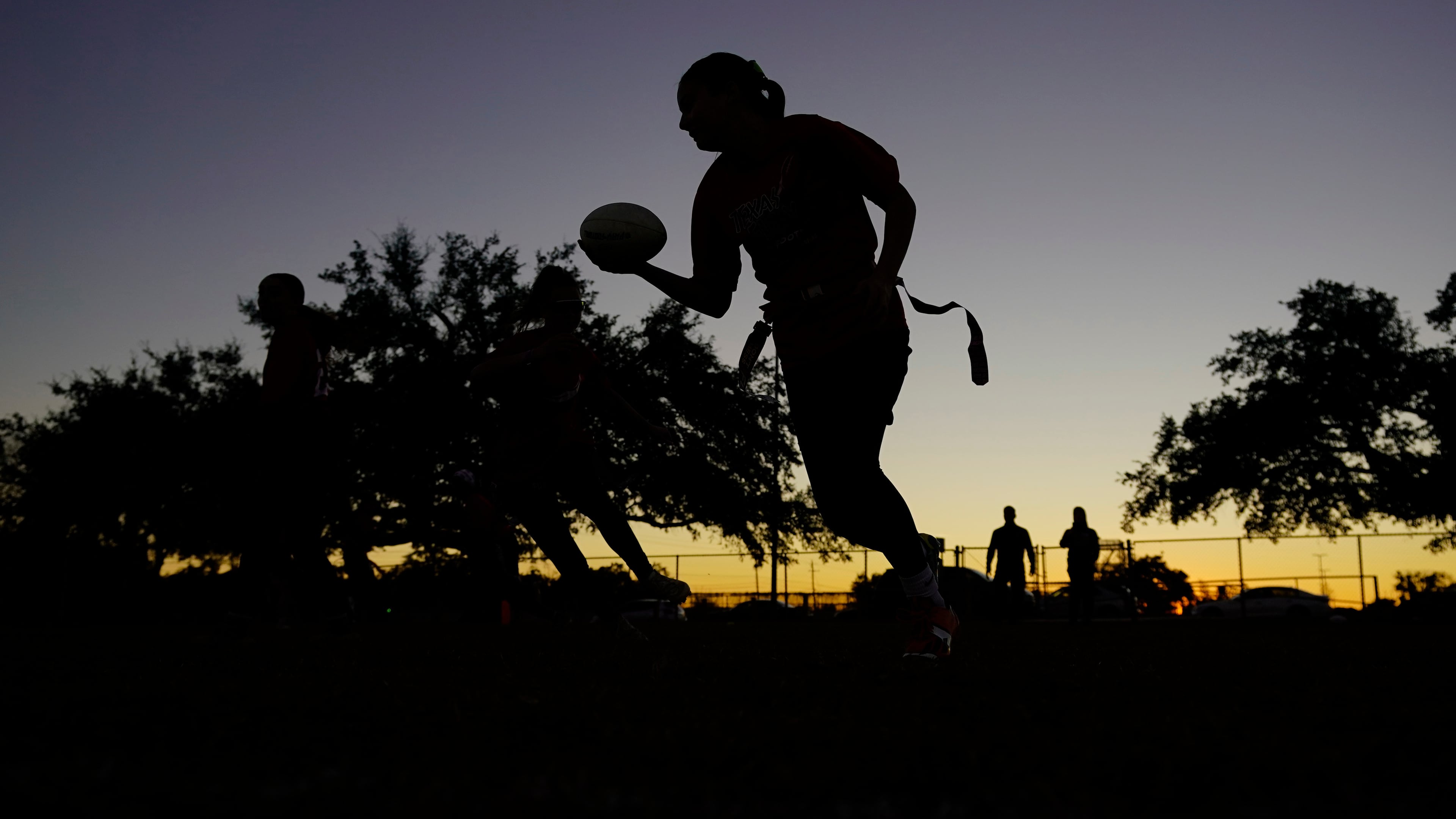 FILE - Players run drills during a practice with Texas Fury, an all-girls flag football select travel team, Dec. 10, 2023, in Austin, Texas. (AP Photo/Eric Gay, File)