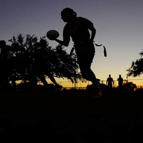 FILE - Players run drills during a practice with Texas Fury, an all-girls flag football select travel team, Dec. 10, 2023, in Austin, Texas. (AP Photo/Eric Gay, File)