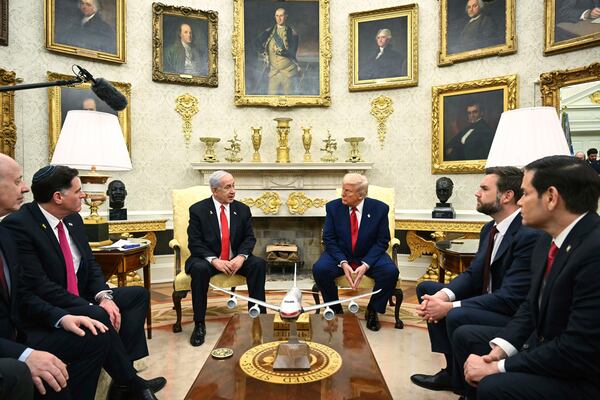 President Donald Trump, center right, meets with Israel's Prime Minister Benjamin Netanyahu, center left, as Secretary of State Marco Rubio, from right, and Vice President JD Vance listen in the Oval Office at the White House in Washington, Monday, April 7, 2025. (Pool via AP)