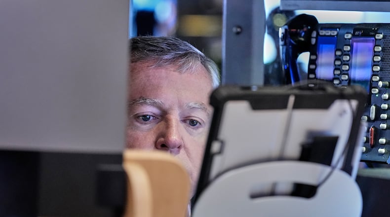 Trader James Lamb works on the floor of the New York Stock Exchange, Friday, May 22, 2026. (AP Photo/Richard Drew)