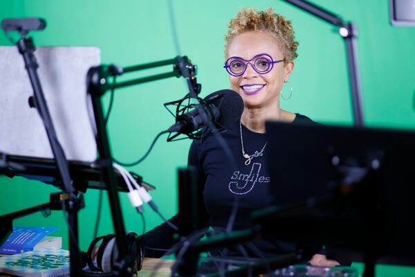Stand-up comedian Janay Smith works at her studio in the basement of her Atlanta home with her podcast "Parenting Up." Janay inspires caregivers to find hope and resilience amidst the difficulties of fighting Alzheimer's.   
 Miguel Martinez /miguel.martinezjimenez@ajc.com