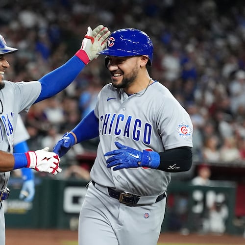 Chicago Cubs' Michael Conforto, right, celebrates his two-run home run against the Arizona Diamondbacks with Cubs' Pedro Ramírez during the sixth inning of a baseball game, Monday, Aug. 24, 2026, in Phoenix. (AP Photo/Ross D. Franklin)