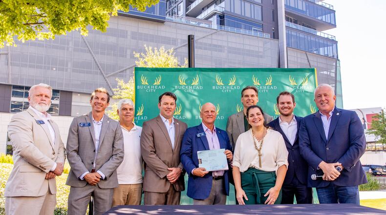 Buckhead City Committee supporters, including CEO Bill White (right), as well as some state senators and local residents, gather for a press conference at Loudermilk Park on Wednesday, Sept 29, 2021. (Jenni Girtman for The Atlanta Journal-Constitution)