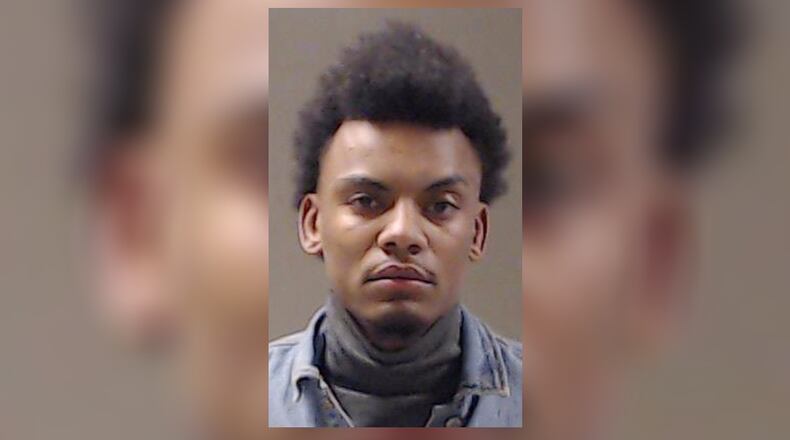 Quincy Tyler Walker, 26, of McDonough, was arrested Sunday at a Buford Highway restaurant.