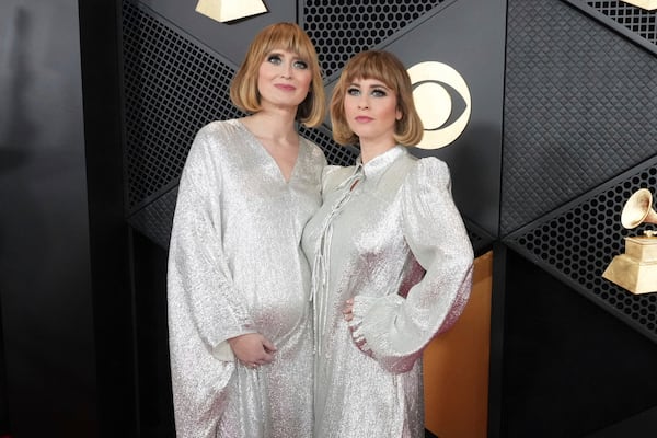 FILE - Jess Wolfe, left, and Holly Laessig of Lucius arrive at the 66th annual Grammy Awards on Sunday, Feb. 4, 2024, in Los Angeles. (Photo by Jordan Strauss/Invision/AP)