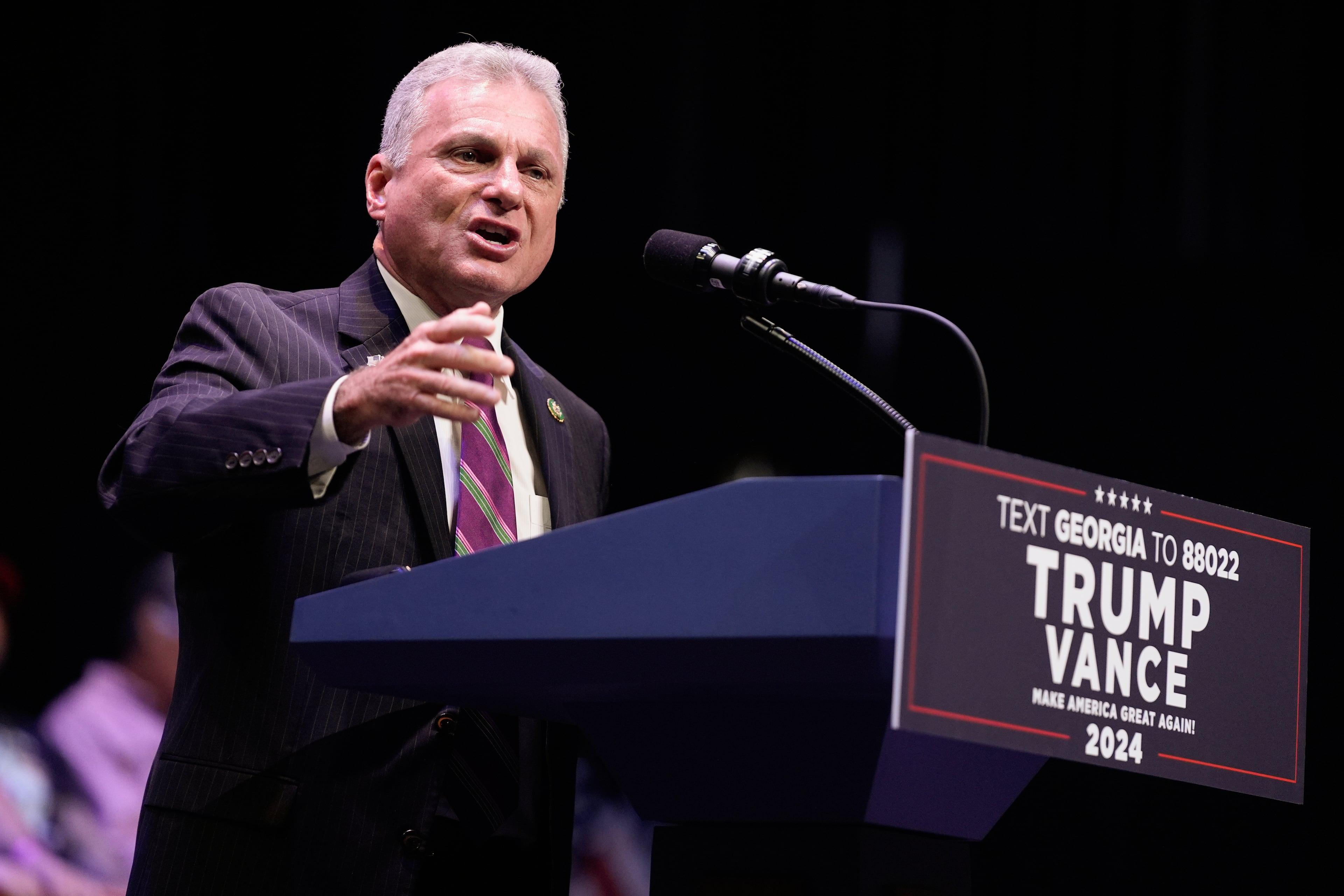 Rep. Buddy Carter, R-Ga., speaks at the Johnny Mercer Theatre Civic Center, in Savannah at an event held while President Donald Trump was running for office. “He wasn’t a star. He wasn’t a successful coach either,” Carter said of Derek Dooley at a different event. (Evan Vucci/AP)