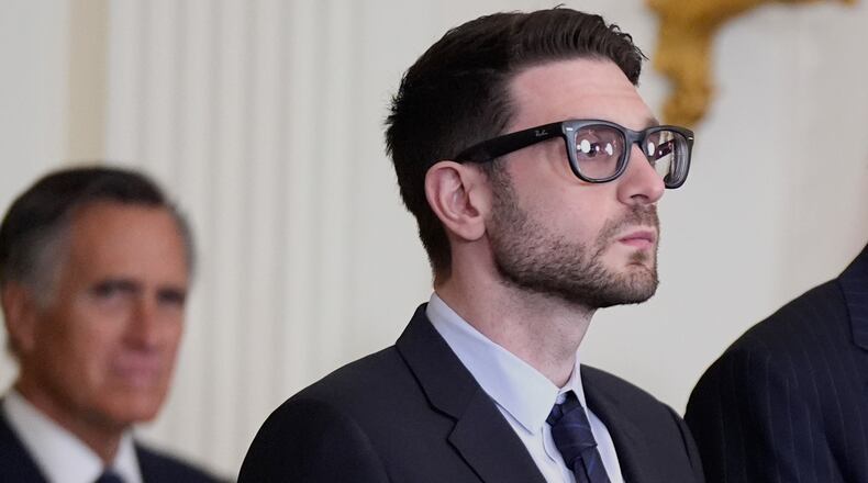 FILE - Alex Soros, on behalf of his father George Soros, stands in the East Room of the White House, Jan. 4, 2025, in Washington. (AP Photo/Manuel Balce Ceneta, File)